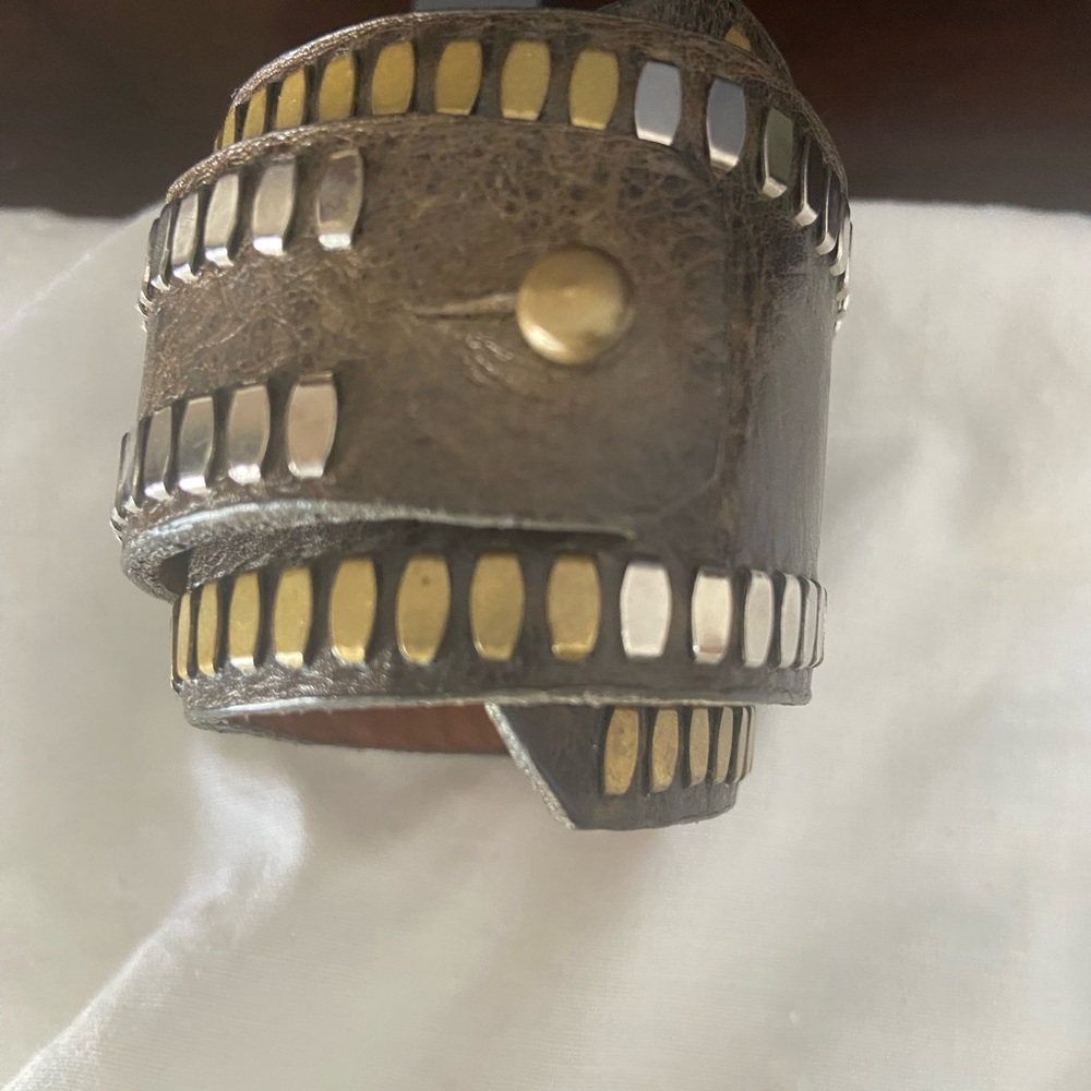 Edgy Leather Cuff Bracelet with Metallic Accents